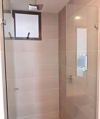a shower with a glass door in a bathroom at Lujo y privacidad, Vista y salida directa al mar in Cartagena de Indias