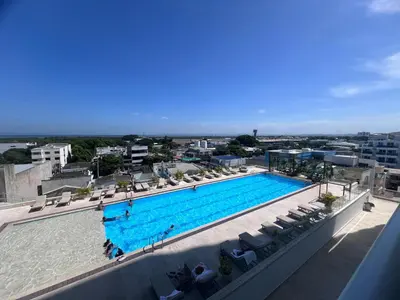 a large swimming pool on top of a building at Apartasuite en Cartagena in Cartagena de Indias