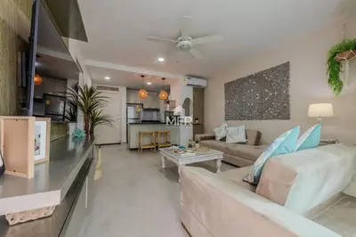 a living room with a couch and a table at Morros 3, 1 Bedroom & Seaview in Cartagena de Indias