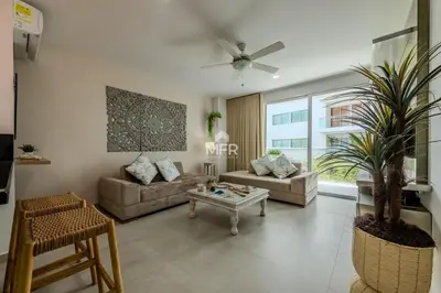 a living room with a couch and a table at Morros 3, 1 Bedroom & Seaview in Cartagena de Indias