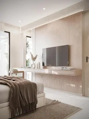 a living room with a large television on a wall at Luxury Oasis Private Pool Wine BBQ and Sea in Cartagena de Indias