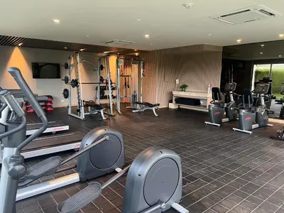 a gym with several treadmills and machines in it at Cartagena Serena del mar Morros IO in Cartagena de Indias