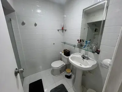 a white bathroom with a sink and a toilet at Cristoforo Colombo CARTAGENA