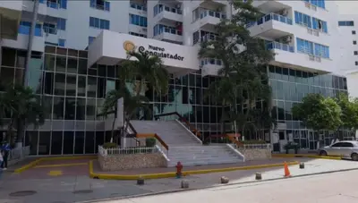 a large building with stairs in front of it at ApartaEstudio cerca a Bocagrande in Cartagena de Indias
