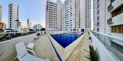 a swimming pool on a balcony of a building at Hermoso apartamento caribeño Bocagrande Cartagena 100 metros in Cartagena de Indias