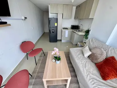a small living room with a couch and a table at magnoloft1104 in Cartagena de Indias