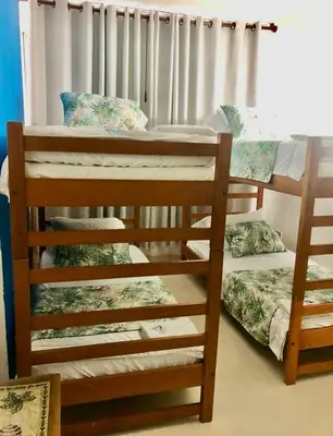 a group of bunk beds in a room at Apartamento playa Bocagrande Los Delfines Cartagena in Cartagena de Indias