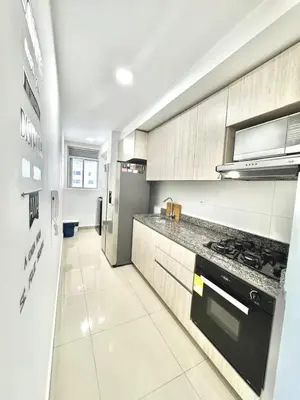 a kitchen with a stove and a counter top at Lujoso alojamiento empresarial en Cartagena in Cartagena de Indias