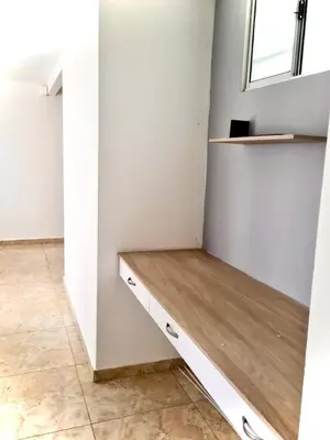 a room with a desk and a window at Apartamento con Vistas a la Ciudad in Barranquilla