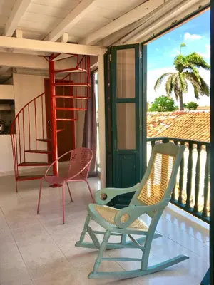 two chairs and a table on a balcony at Cartagena - stunning location in walled city in Cartagena de Indias
