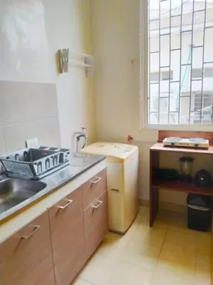 a small kitchen with a sink and a window at alojamiento centro histórico - 3-2 in Cartagena de Indias