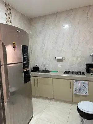 a kitchen with a stainless steel refrigerator and a sink at Apto 2 hab Cerca del Centro Histórico in Cartagena de Indias