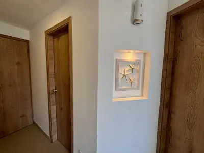 a room with a painting on the wall and a door at Luxury mediterranean Suite in Cartagena de Indias