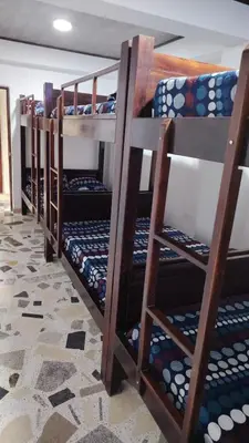 a group of bunk beds in a room at CARTAGENA BOQUILLA BEACH HOSTEl in Cartagena de Indias