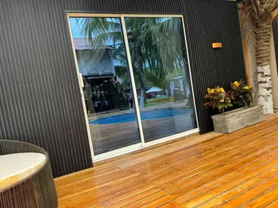 a room with a sliding glass door with a patio at Habitaciones luxury baru in Playa Blanca