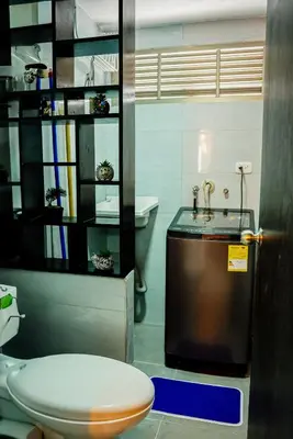 a bathroom with a toilet and a sink at Apartamento Laguito Cartagena in Cartagena de Indias