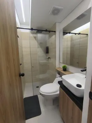 a bathroom with a toilet and a sink and a shower at Apartamento Luxury en Cartagena con Vista al mar in Cartagena de Indias