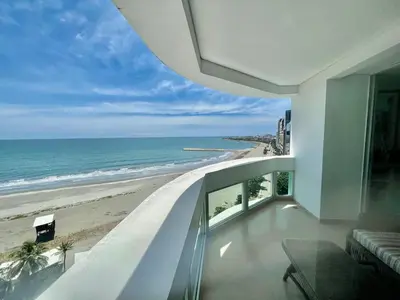 a balcony with a view of the beach at Cartagena Excelente Apartamento in Cartagena de Indias