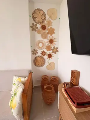 a room with a wall with flowers on the wall at Sea view with private balcony in Cartagena de Indias