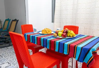 a table with a plate of fruit on it at Bogavante Getsemani para familias in Cartagena de Indias