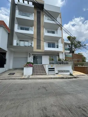 a large white building with stairs in front of it at aparta estudio susheria in Sincelejo