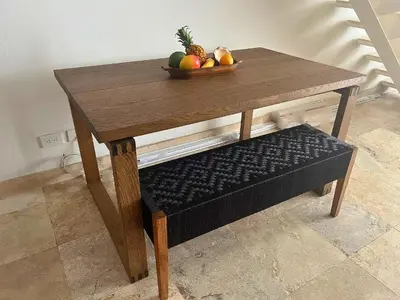 a wooden table with a bowl of fruit on it at Duplex con Piscina privada en Centro Histórico in Cartagena de Indias