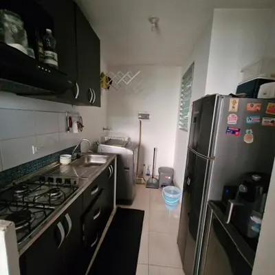 a kitchen with a stainless steel refrigerator and a sink at Apartmento en Parque Heredia in Cartagena de Indias