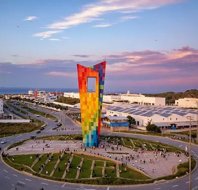 a large colorful monument in a city with a street at Apartamentos Palmar - Excelente Ubicación by SOHO in Barranquilla