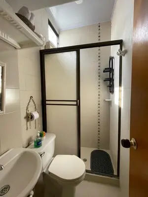 a bathroom with a shower and a toilet and a sink at Casa Inés Tolú in Tolú