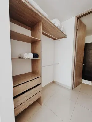 a room with a closet with wooden shelves at Apartamento con hermosa vista en Bocagrande in Cartagena de Indias