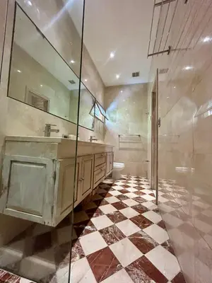 a bathroom with a sink and a mirror at Apto cuesta 203 in Cartagena de Indias