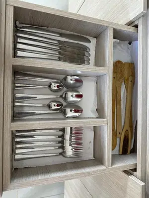 a drawer filled with knives and other kitchen utensils at 302 Apartamento frente al mar in San Bernardo del Viento