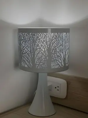 a lamp with a picture of trees on it at Suite Frente al Mar en Cartagena 1410 in Cartagena de Indias