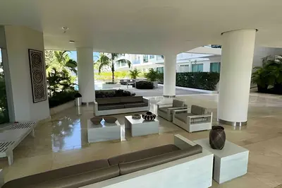 a living room with couches and tables in a building at Apto en Morros 3 con vista al Mar 504 in Cartagena de Indias