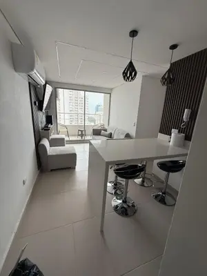 a kitchen and living room with a table and chairs at Cartagena Mood ON in Cartagena de Indias
