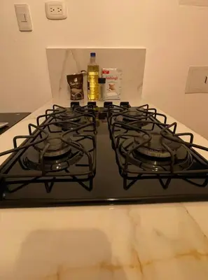 a stove top with two burners on top of it at Escapate a Tolú - Lindo Apartamento in Santiago