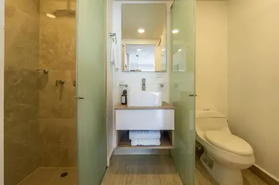 a bathroom with a sink and a toilet and a shower at CB1043 | Suite premium en Cartagena hermosa vista in Cartagena de Indias