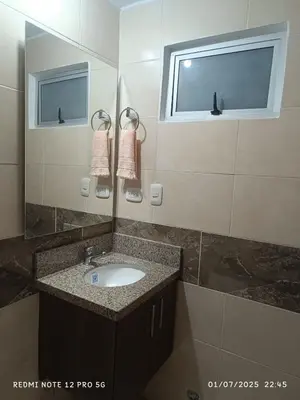 a bathroom with a sink and a mirror at Lajoya in Barranquilla