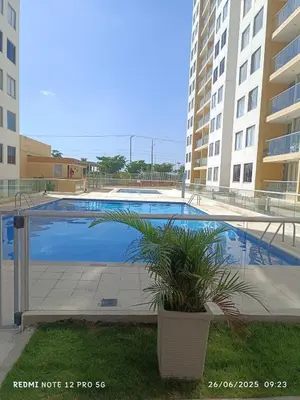 a swimming pool in the middle of a building at Lajoya in Barranquilla