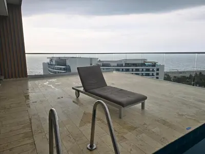 a chair sitting on the roof of a building at Espectacular Apartamento 9no piso in Cartagena de Indias