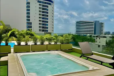 a swimming pool on the roof of a building at Nueva, Lujosa y Exclusiva Suite Vista al Mar in Cartagena de Indias