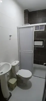 a bathroom with a toilet and a sink at Hospedaje MangleRojo - Cerca al Mar in Coveñas