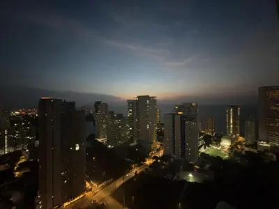 a city skyline at night with tall buildings at Piso 32 Vista al mar y centro histórico in Cartagena de Indias