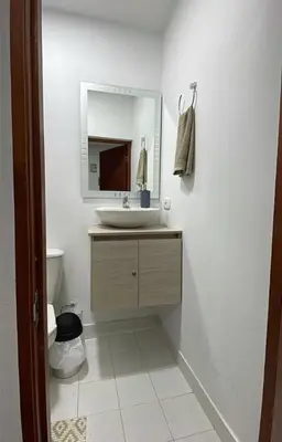 a bathroom with a sink and a mirror at apartamento cerca de la playa in Cartagena de Indias