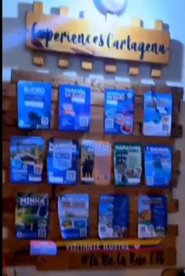 a display of books on a wall in a store at Confort Compartida Ctg x3 in Cartagena de Indias