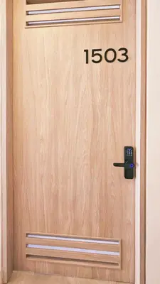 a wooden door with the number on it at Caribbean Retreat Direct Beach Access in Santa Marta