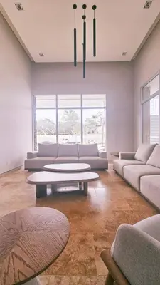 a living room with couches and a coffee table at Caribbean Retreat Direct Beach Access in Santa Marta