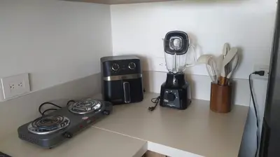 a kitchen counter top with a blender and a blender at Baia Kristal Andrés Cartagena in Cartagena de Indias