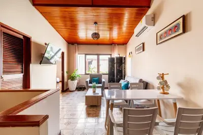 a living room with a table and some chairs at Casa Cristi #5 in Cartagena de Indias