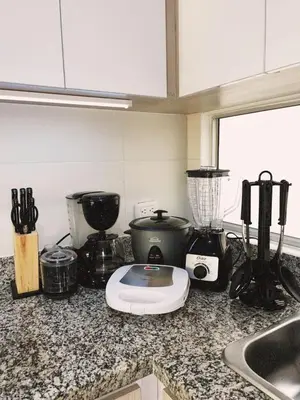 a kitchen counter with a blender and appliances on it at Amazing apartment cerca the beach Manzanillo Sector in Cartagena de Indias